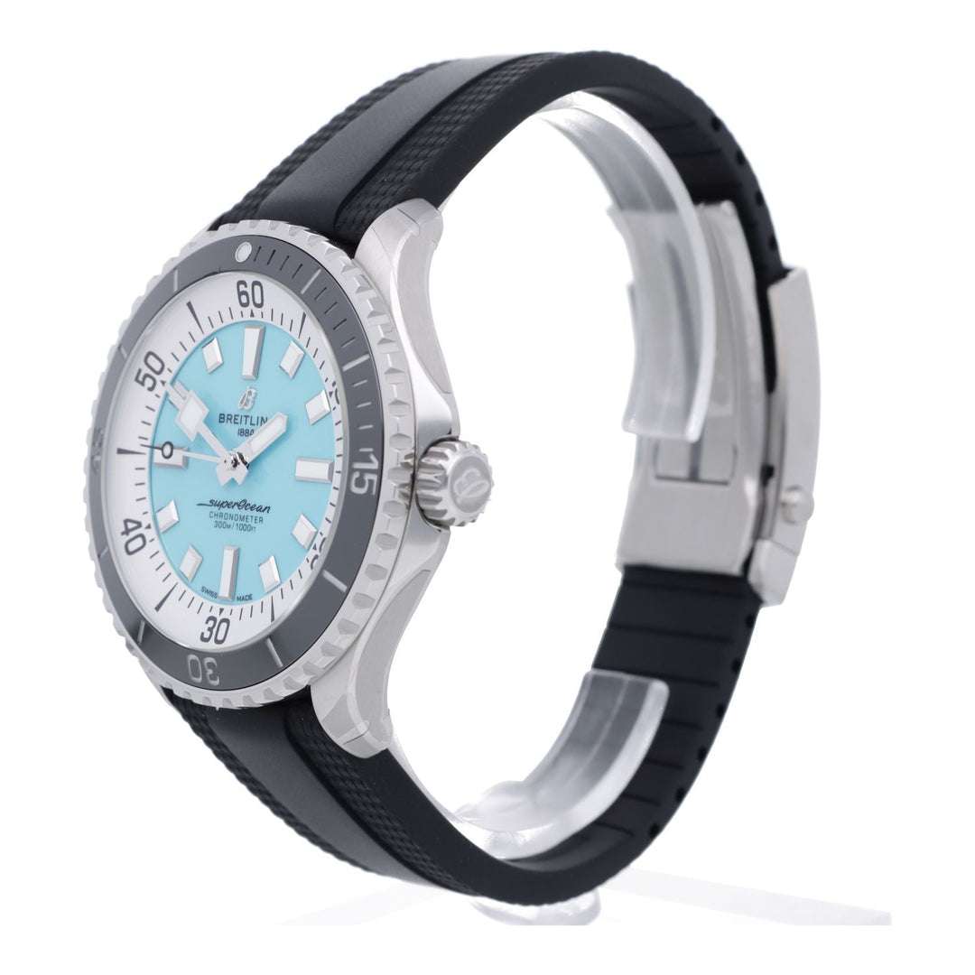 Orologio subacqueo laterale: cassa acciaio, quadrante turchese, cinturino nero
