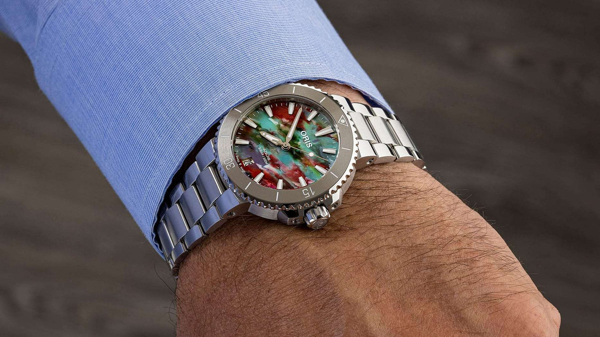 Oris Aquis Date Upcycle Uomo 36,5mm Acciaio Quadrante Multicolore PET Riciclato Automatico Calibro 733-1 Lunetta Ceramica Vetro Zaffiro Bracciale Acciaio Data Super-LumiNova 300m Ref. 01 733 7770 4150-Set Oasi Watch