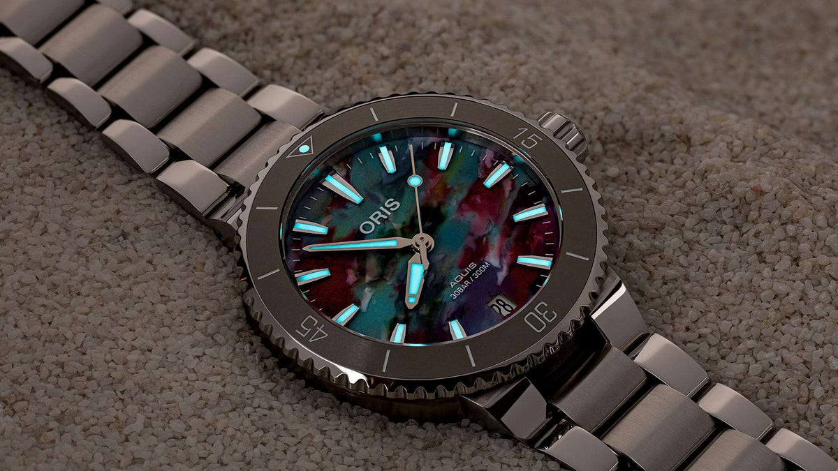 Oris Aquis Date Upcycle Uomo 36,5mm Acciaio Quadrante Multicolore PET Riciclato Automatico Calibro 733-1 Lunetta Ceramica Vetro Zaffiro Bracciale Acciaio Data Super-LumiNova 300m Ref. 01 733 7770 4150-Set Oasi Watch