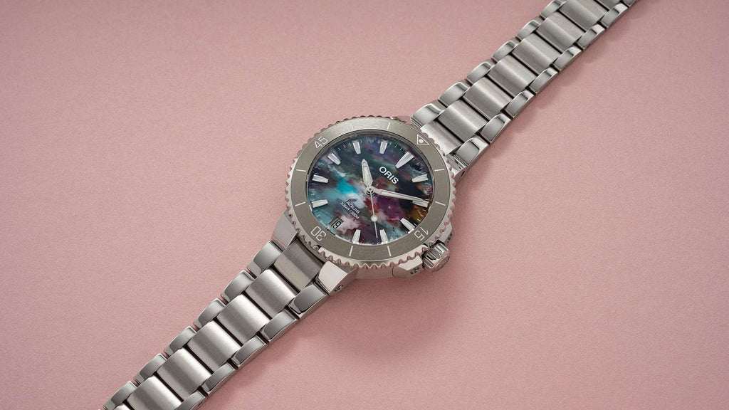 Oris Aquis Date Upcycle Uomo 36,5mm Acciaio Quadrante Multicolore PET Riciclato Automatico Calibro 733-1 Lunetta Ceramica Vetro Zaffiro Bracciale Acciaio Data Super-LumiNova 300m Ref. 01 733 7770 4150-Set Oasi Watch