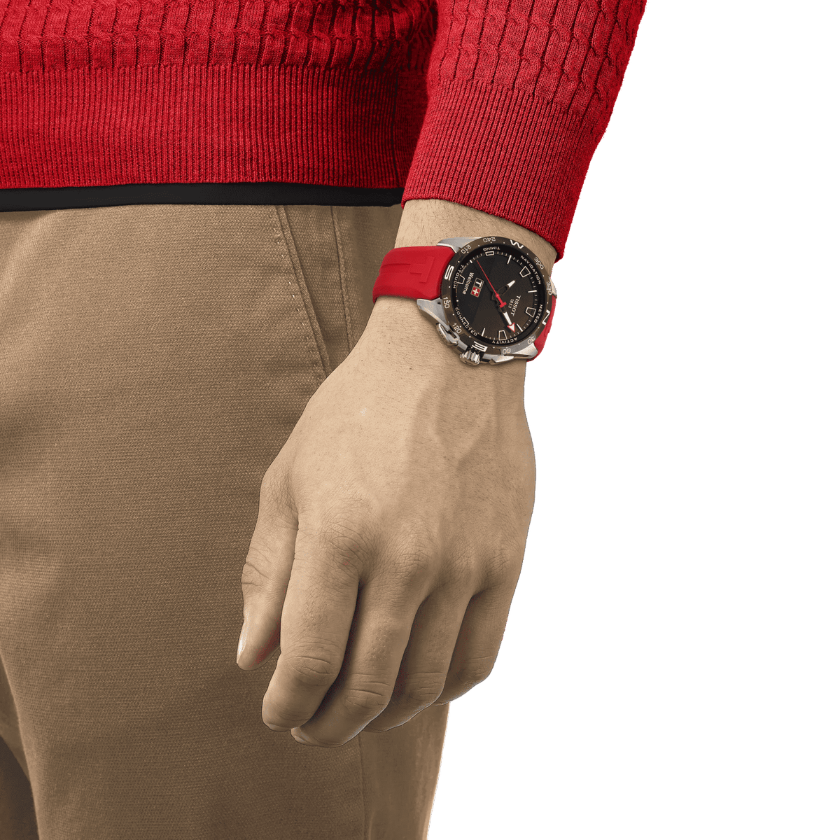 Orologio Tissot al polso: quadrante nero con dettagli rossi e cinturino rosso
