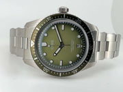 Orologio subacqueo Oris, bracciale in acciaio, quadrante verde sfumato e data