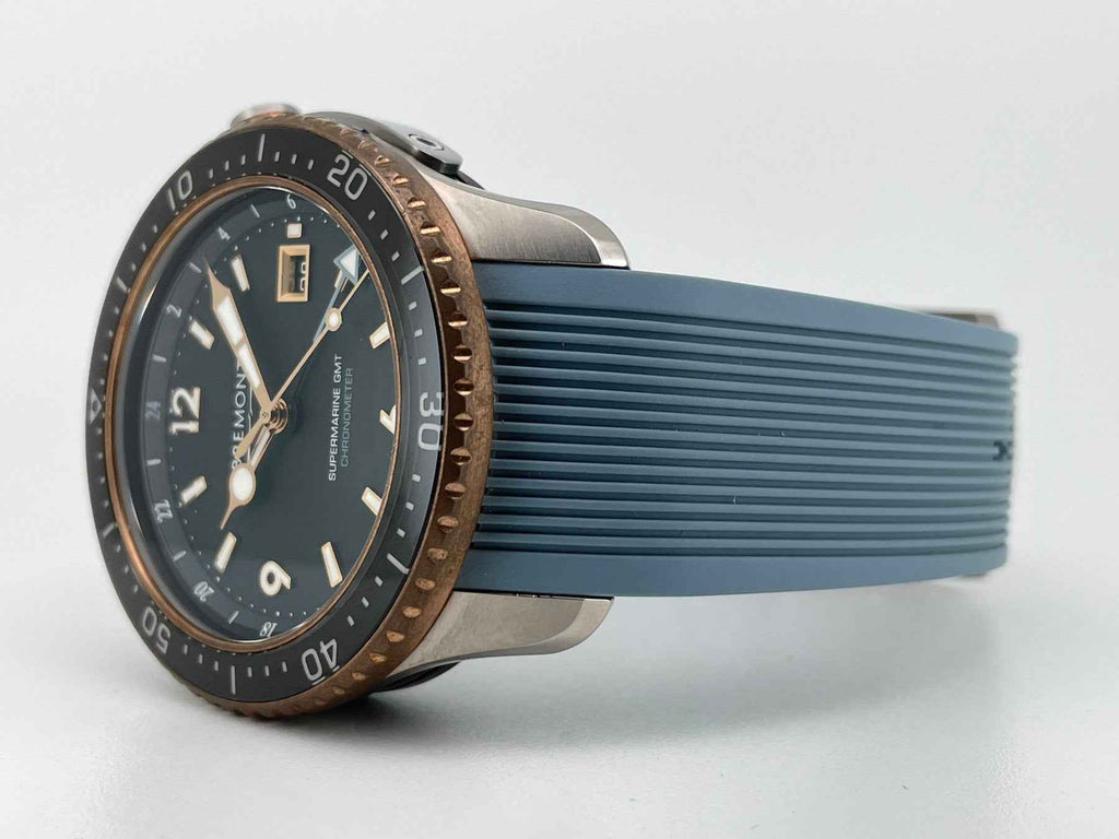 Orologio subacqueo da uomo: cassa in titanio e bronzo con cinturino gomma azzurro