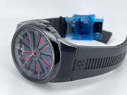 Orologio automatico nero con cinturino in gomma e quadrante blu scuro, lancette rosse