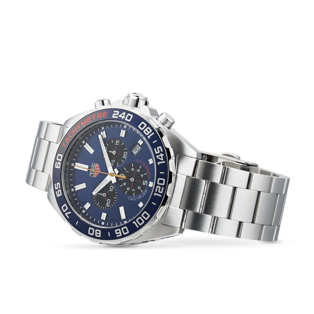 Orologio cronografo TAG Heuer con quadrante blu, pulsanti e bracciale in acciaio