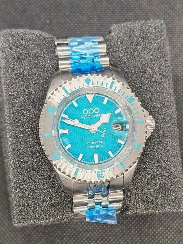 Orologio subacqueo con quadrante blu-verde a motivo e bracciale in acciaio con inserti blu
