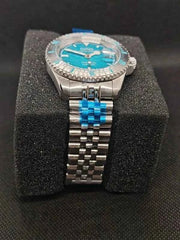 Orologio subacqueo con cassa in acciaio, quadrante blu-verde e bracciale in acciaio