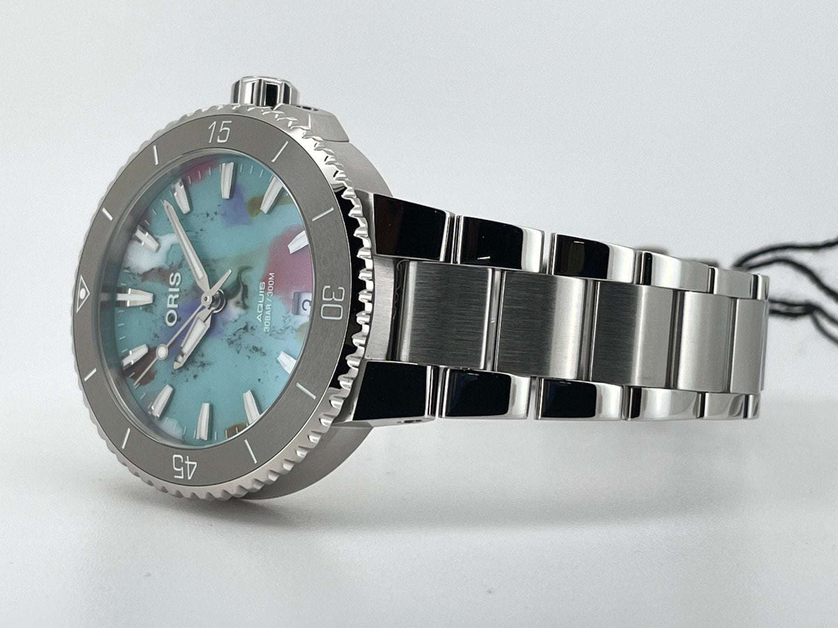 Oris Aquis Date Upcycle Uomo 36,5mm Acciaio Quadrante Multicolore PET Riciclato Automatico Calibro 733-1 Lunetta Ceramica Vetro Zaffiro Bracciale Acciaio Data Super-LumiNova 300m Ref. 01 733 7770 4150-Set Oasi Watch