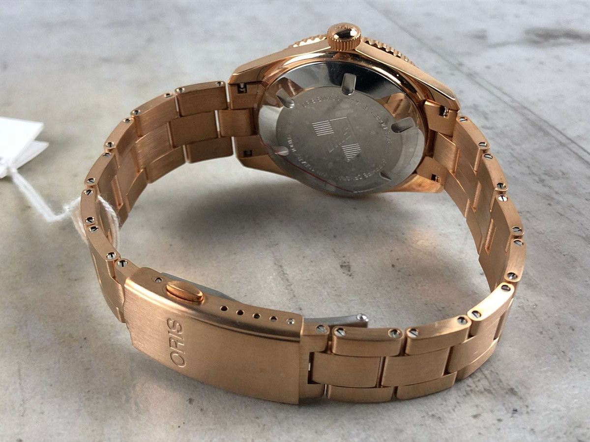 Orologio subacqueo bronzo, fondello e bracciale a maglie, vista posteriore