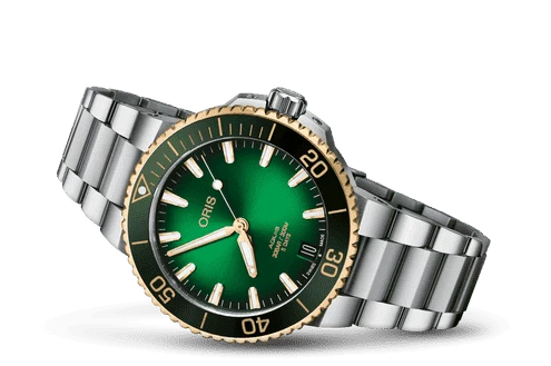 Orologio subacqueo ORIS con quadrante verde, bracciale in acciaio e ghiera oro
