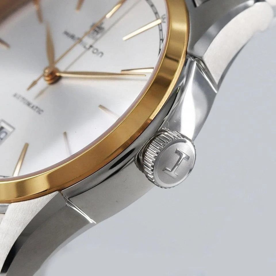Orologio automatico con lunetta e corona bicolore oro e argento, cinturino metallico