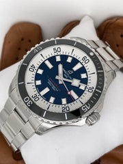 Orologio subacqueo Breitling con quadrante blu e bracciale in acciaio, lunetta in ceramica