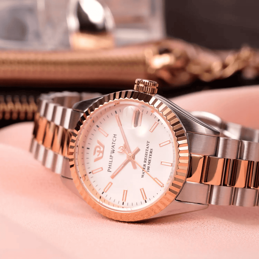 Orologio donna acciaio e oro rosa, quadrante bianco e corona zigrinata.