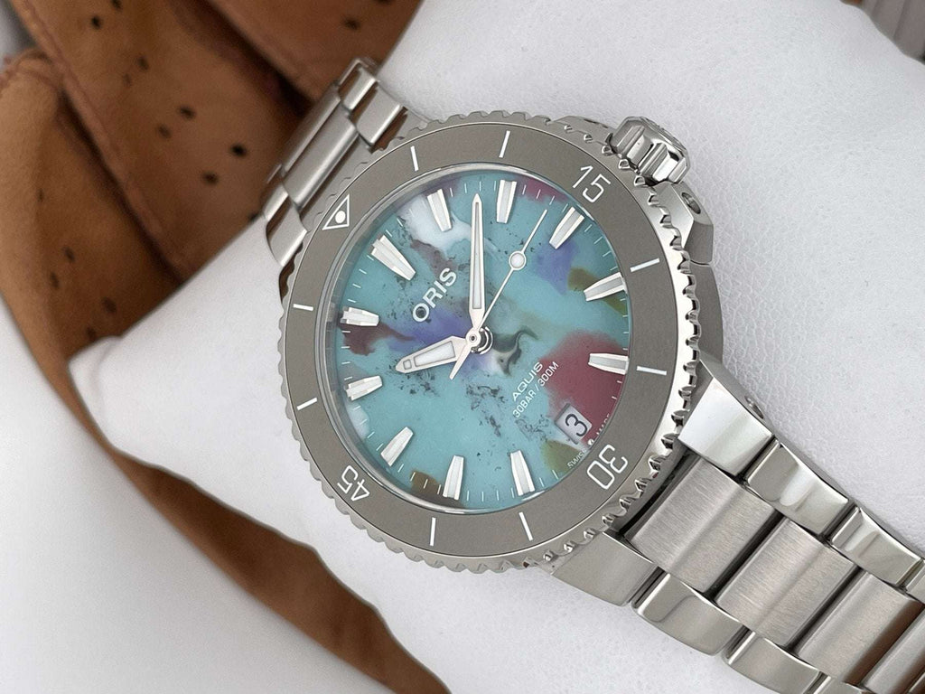 Oris Aquis Date Upcycle Uomo 36,5mm Acciaio Quadrante Multicolore PET Riciclato Automatico Calibro 733-1 Lunetta Ceramica Vetro Zaffiro Bracciale Acciaio Data Super-LumiNova 300m Ref. 01 733 7770 4150-Set Oasi Watch