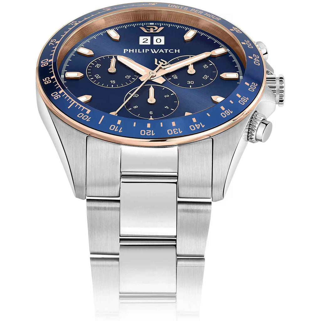 Orologio cronografo con quadrante blu, indici chiari e ghiera con accento rosé