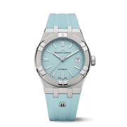 Orologio automatico con quadrante turchese, cassa acciaio e cinturino gomma turchese.