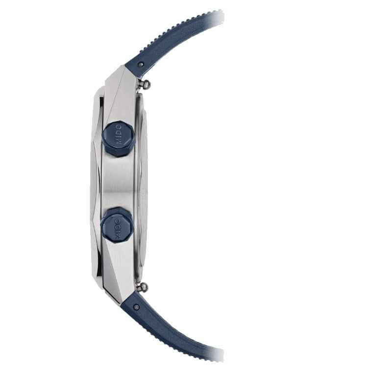 Orologio Mido con cassa in acciaio e cinturino blu, vista laterale con pulsanti