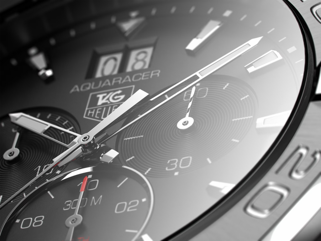 Dettaglio quadrante nero TAG Heuer Aquaracer con cronografo e indici