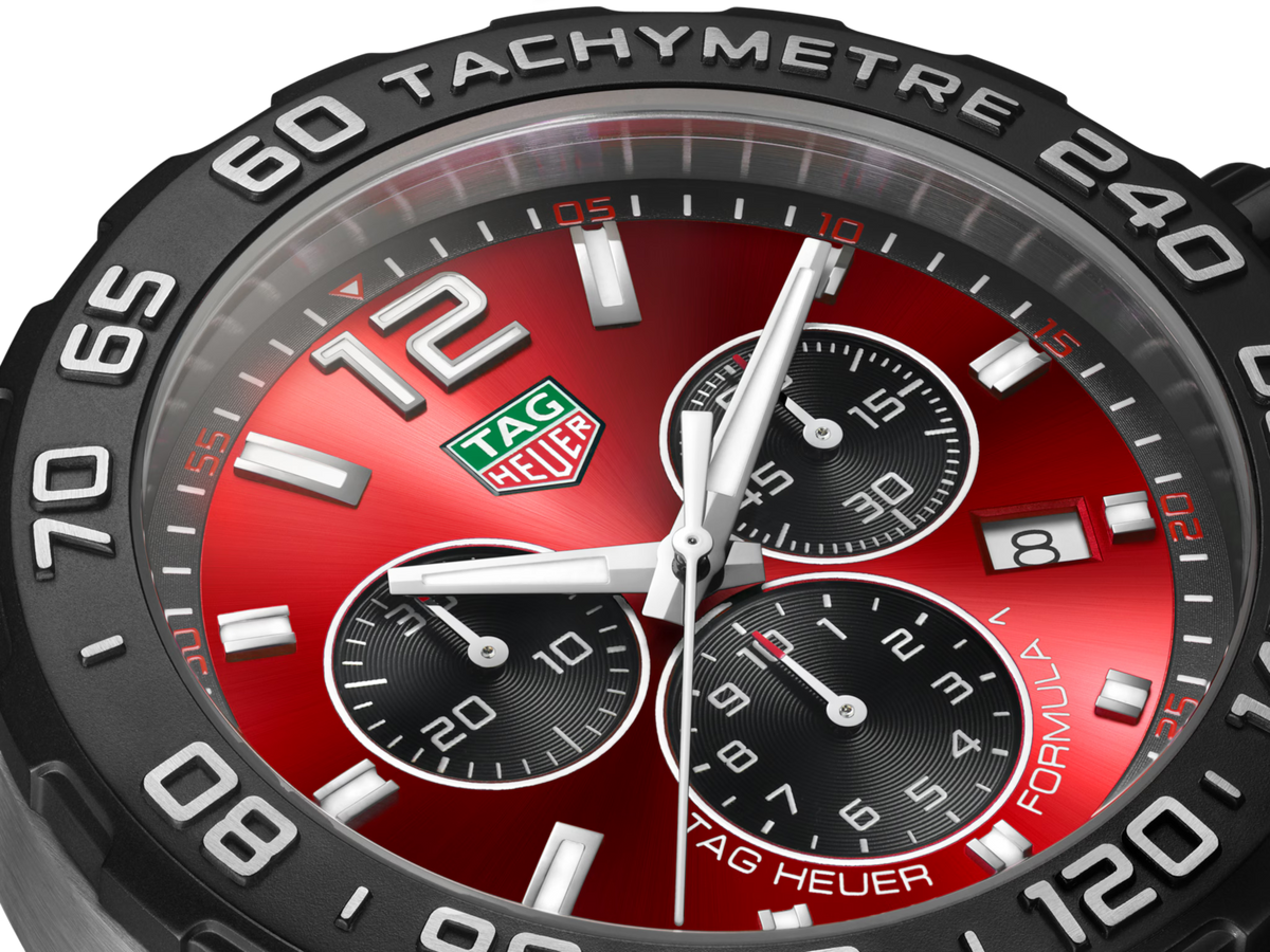 Orologio cronografo con quadrante rosso soleil, contatori neri e lancette argentate
