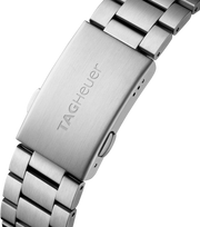 Orologio TAG Heuer in acciaio con bracciale e chiusura incisa “TAG Heuer”.