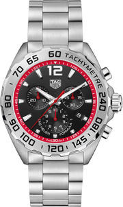 Orologio cronografo TAG Heuer in acciaio, quadrante nero con dettagli rossi e indici luminosi.