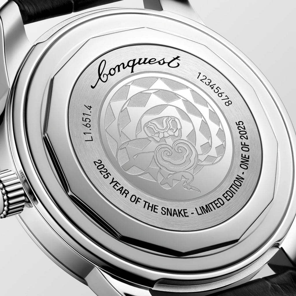 Orologio Longines in acciaio, fondello inciso con serpente e pelle nera