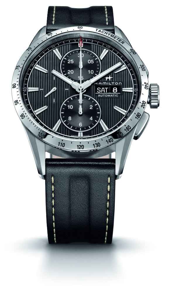 Orologio automatico con quadrante nero, cinturino in pelle scura e cuciture gialle