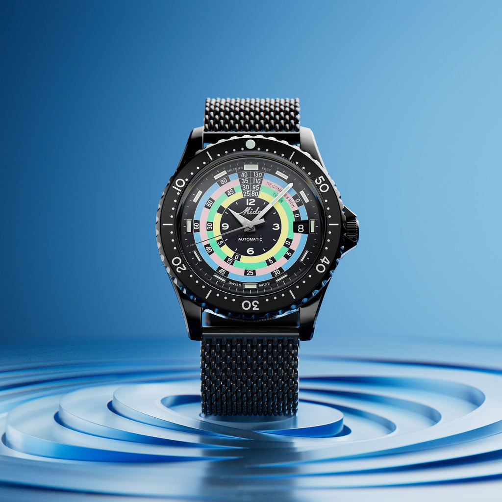 Orologio Ocean Star nero con quadrante multicolore e cinturino a maglia scura