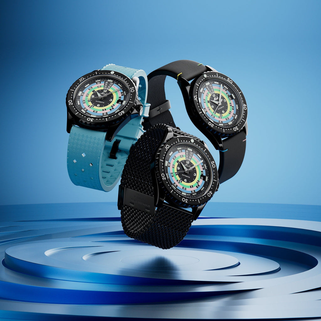 Orologi Ocean Star su supporto, quadranti multicolore con cinturini blu e nero