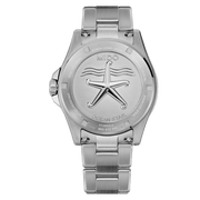 Orologio MIDO con fondello in acciaio e stella incisa, indicazioni sul retro