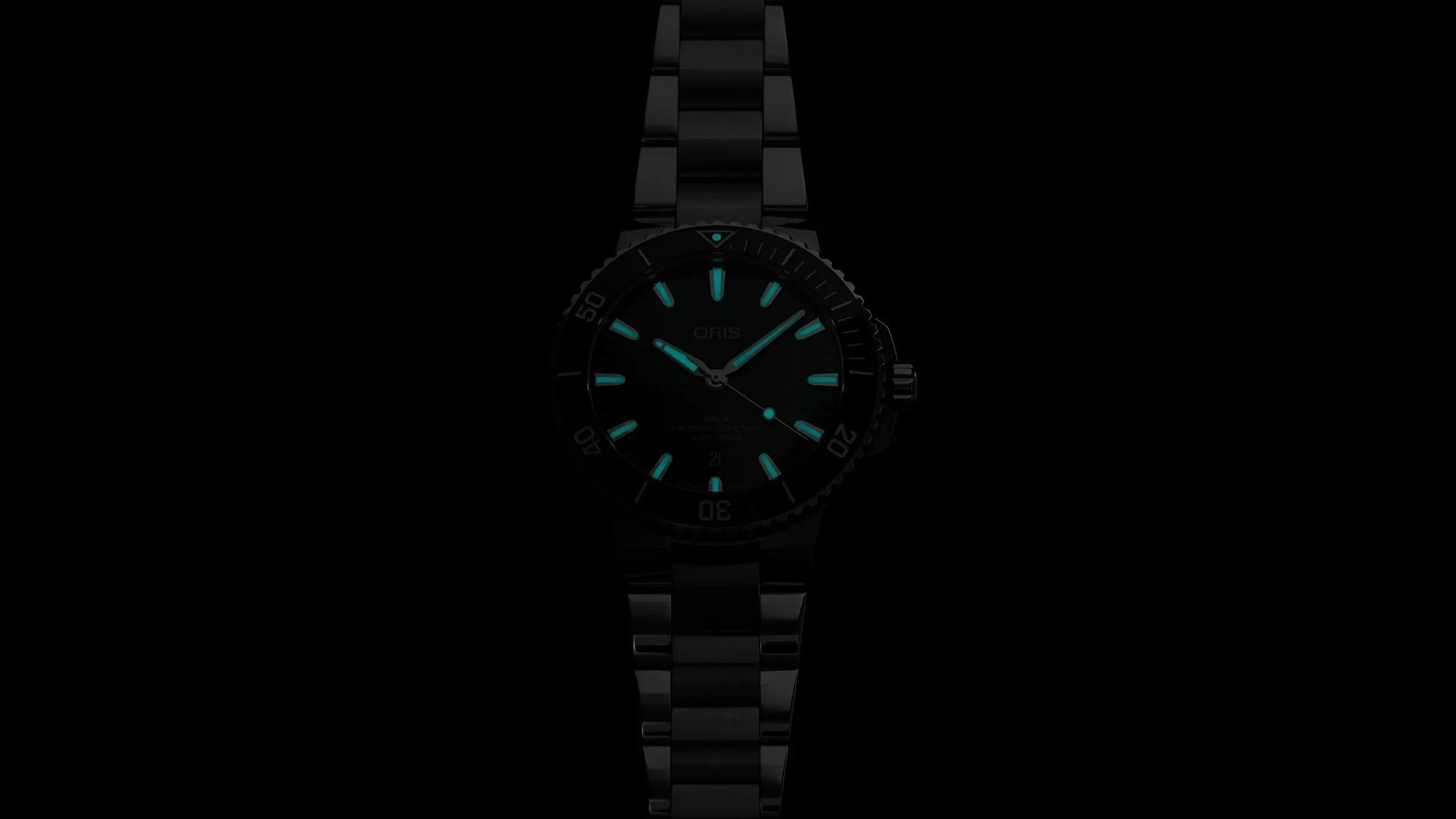 Orologio con quadrante verde luminescente e bracciale in acciaio
