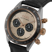 Orologio con cinturino nero e cassa argento, quadrante champagne e subquadranti.