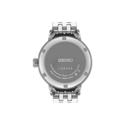 Retro dell’orologio Seiko con bracciale in acciaio e incisioni sul fondello
