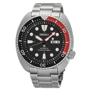 Orologio subacqueo Seiko automatico acciaio 42 mm, quadrante nero, giorno/data, lunetta rossa