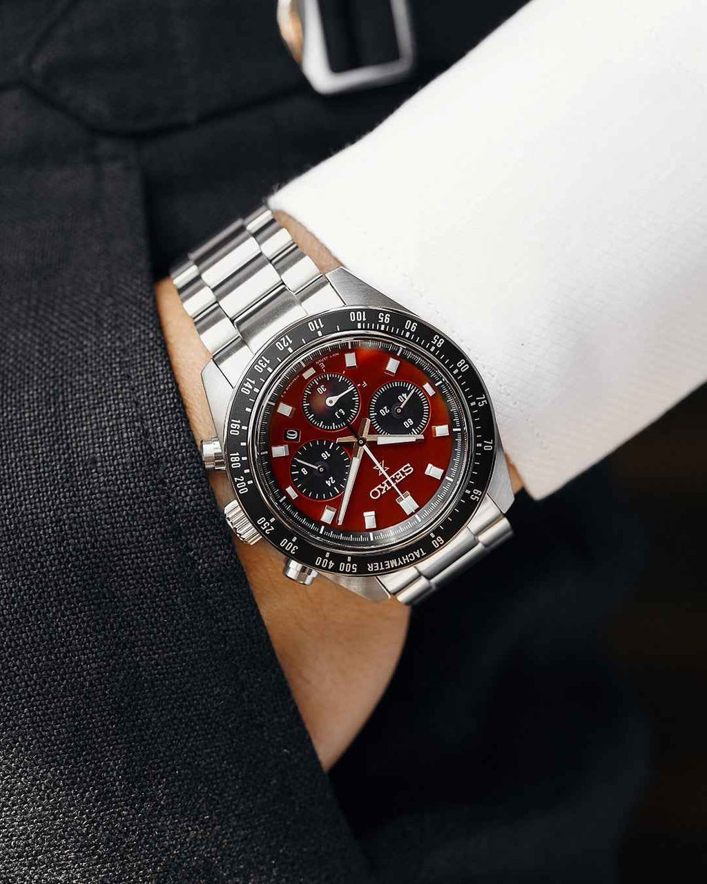 Orologio cronografo Seiko Prospex in acciaio, quadrante nero e rosso, bracciale acciaio