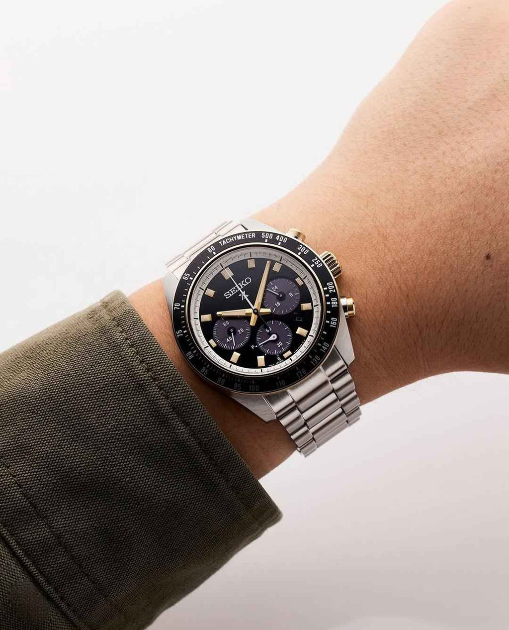 Seiko Prospex cronografo in acciaio, quadrante nero e oro, bracciale metallico