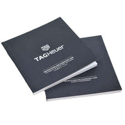 Istruzioni e garanzia TAG Heuer in custodia blu scuro, fascicolo piegato