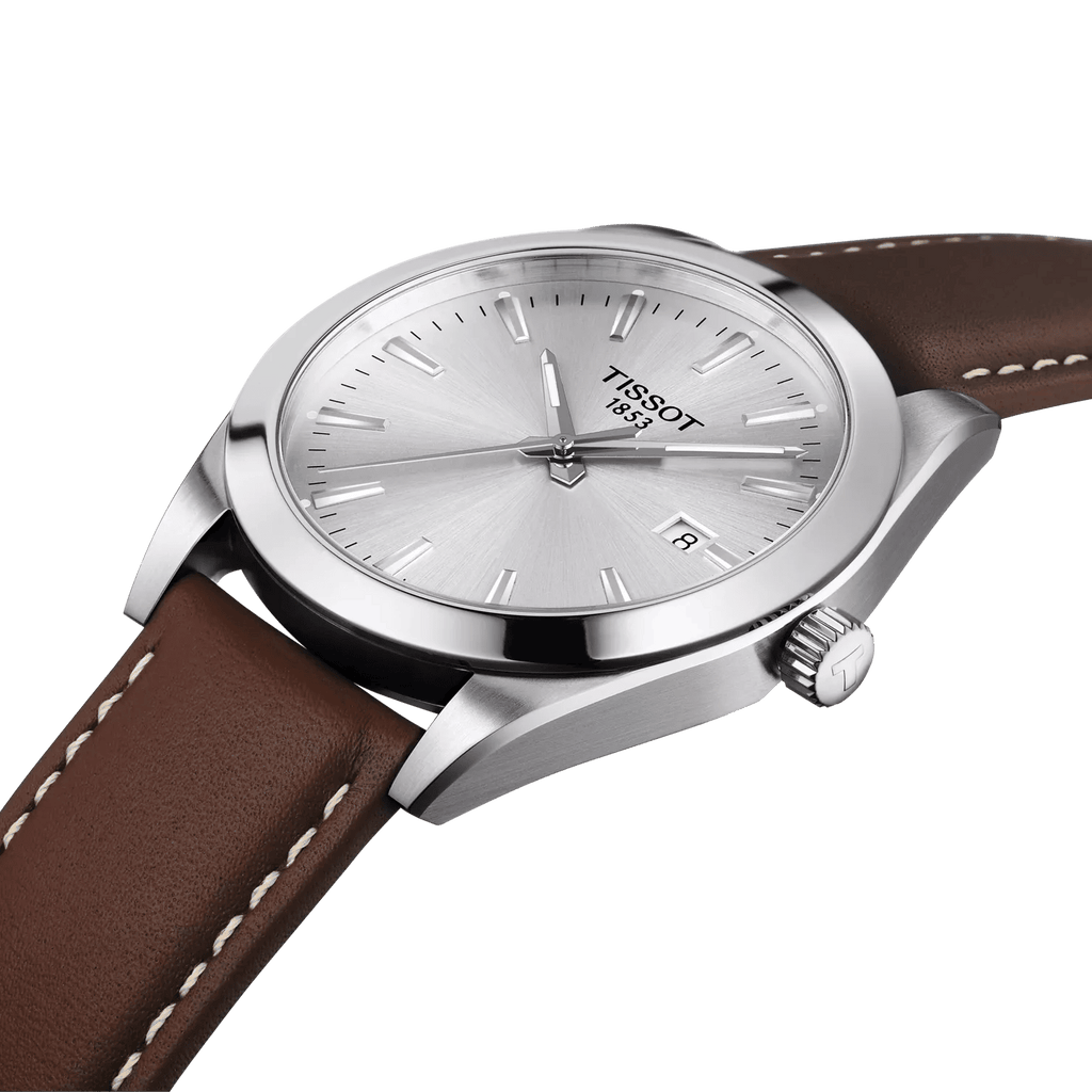 Orologio Tissot in acciaio con cinturino marrone, quadrante argento e corona laterale