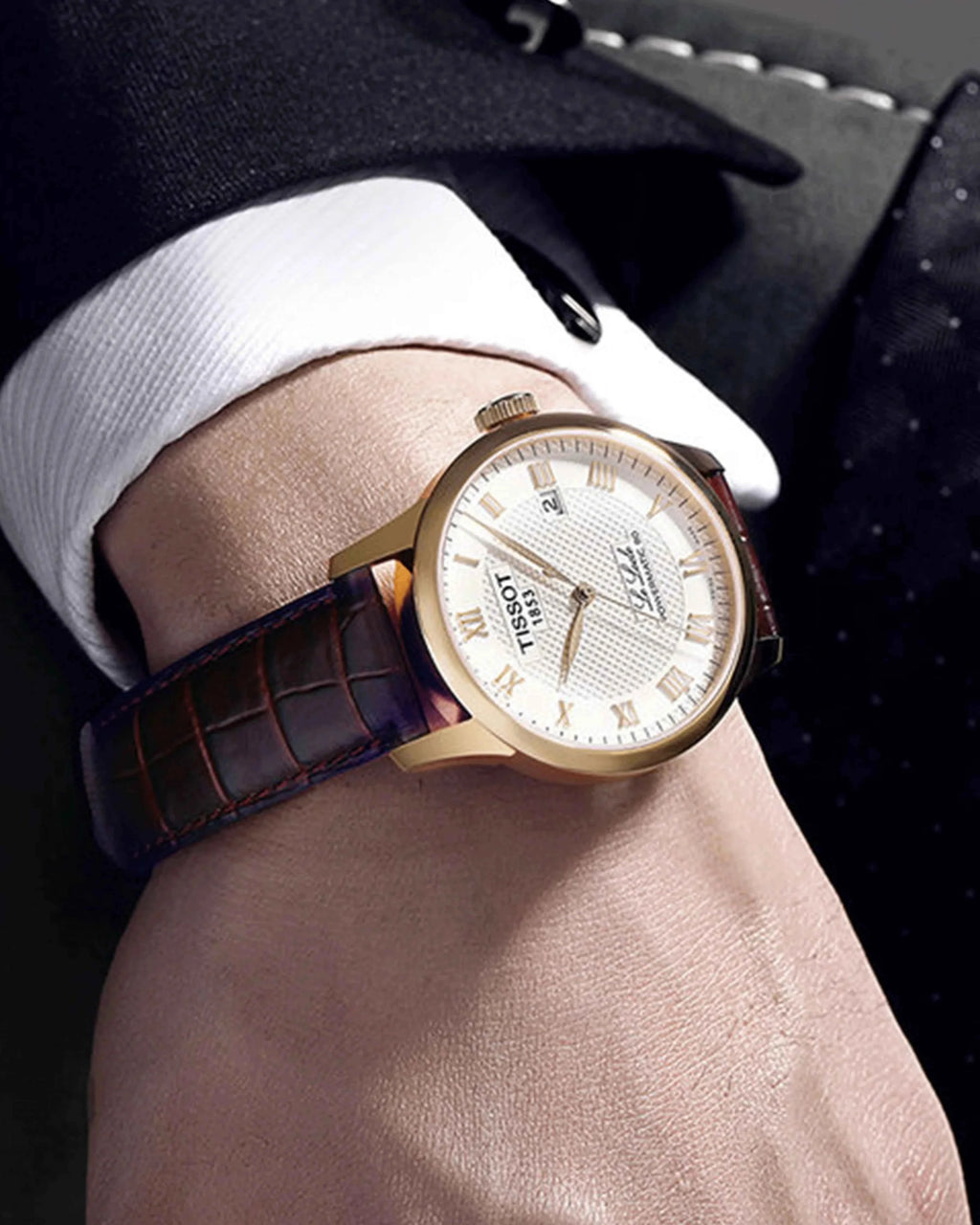 Orologio automatico con quadrante argento, indici romani e cinturino in pelle marrone