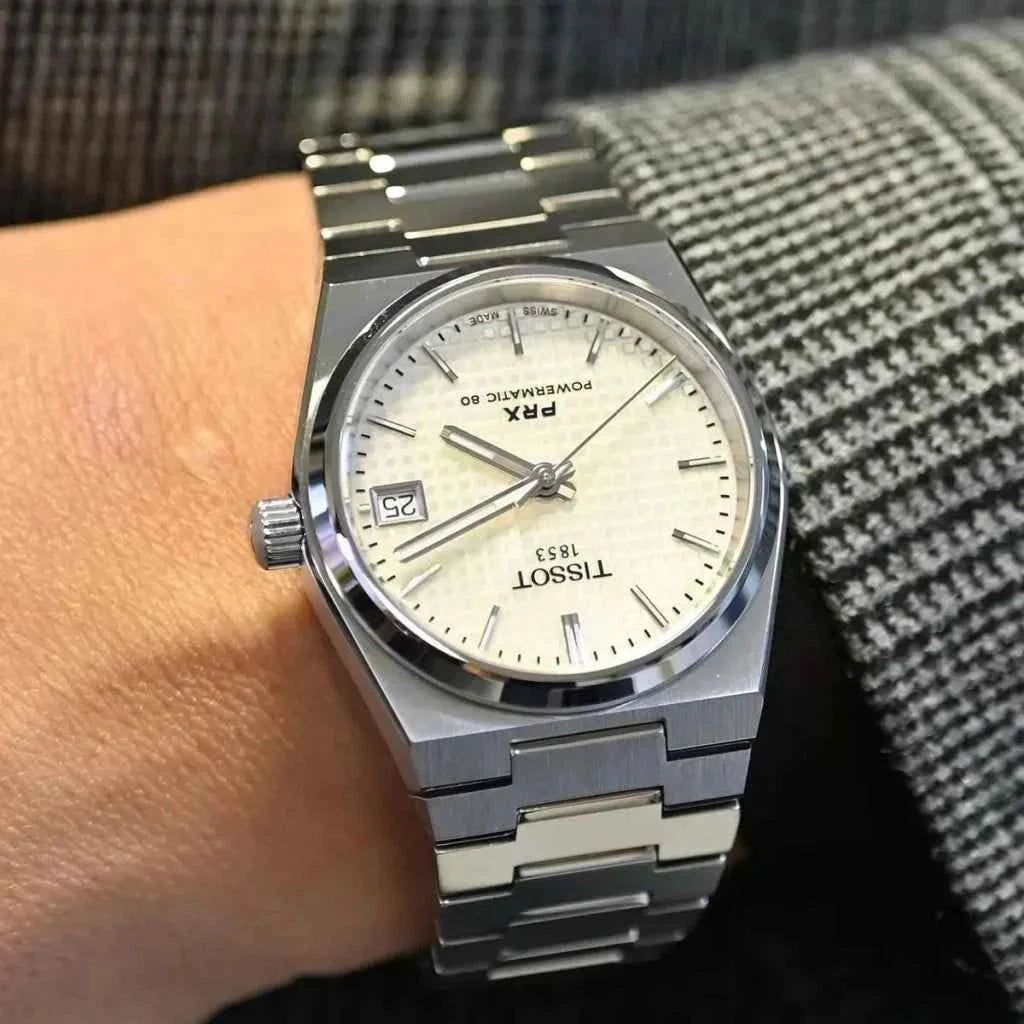 Orologio Tissot PRX con quadrante bianco, indici e cinturino in acciaio