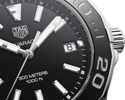 Orologio subacqueo: quadrante nero con indici bianchi e data al 8