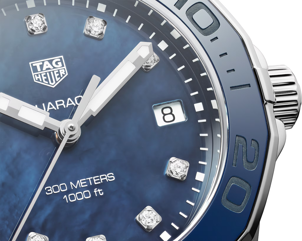 Orologio con quadrante blu, indici in diamanti, data 8 e numeri lunetta azzurri