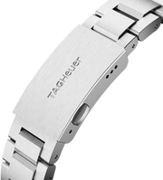 Bracciale e chiusura in acciaio dell’orologio subacqueo con scritta TAG Heuer