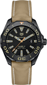 Orologio subacqueo nero con quadrante nero, lunetta nera e cinturino nylon beige