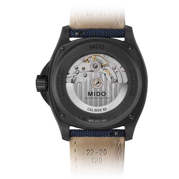 Fondello dell’orologio MIDO con meccanismo visibile e cinturino blu