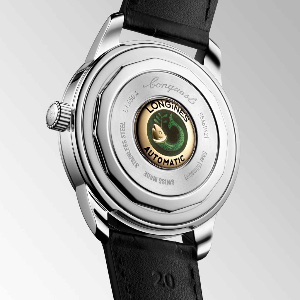 Fondello dell’orologio automatico in acciaio con scritte e emblema verde