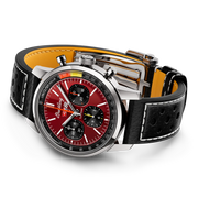 Orologio cronografo con quadrante rosso e dettagli multicolore, cinturino nero