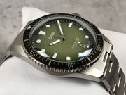 Orologio Oris con lunetta nera e quadrante verde, indici luminescenti