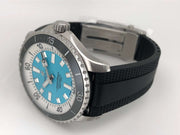 Orologio Breitling con cassa acciaio e quadrante turchese, cinturino caucciù nero