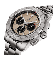 Orologio Breitling con quadrante beige, lunetta tachimetrica nera e bracciale acciaio